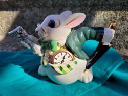 White Rabbit and Elephant with Tea Pot on a Pillow